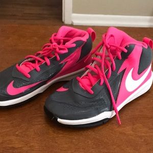 Nike Team Hustle D7 size 3.5 Y pink high tops.